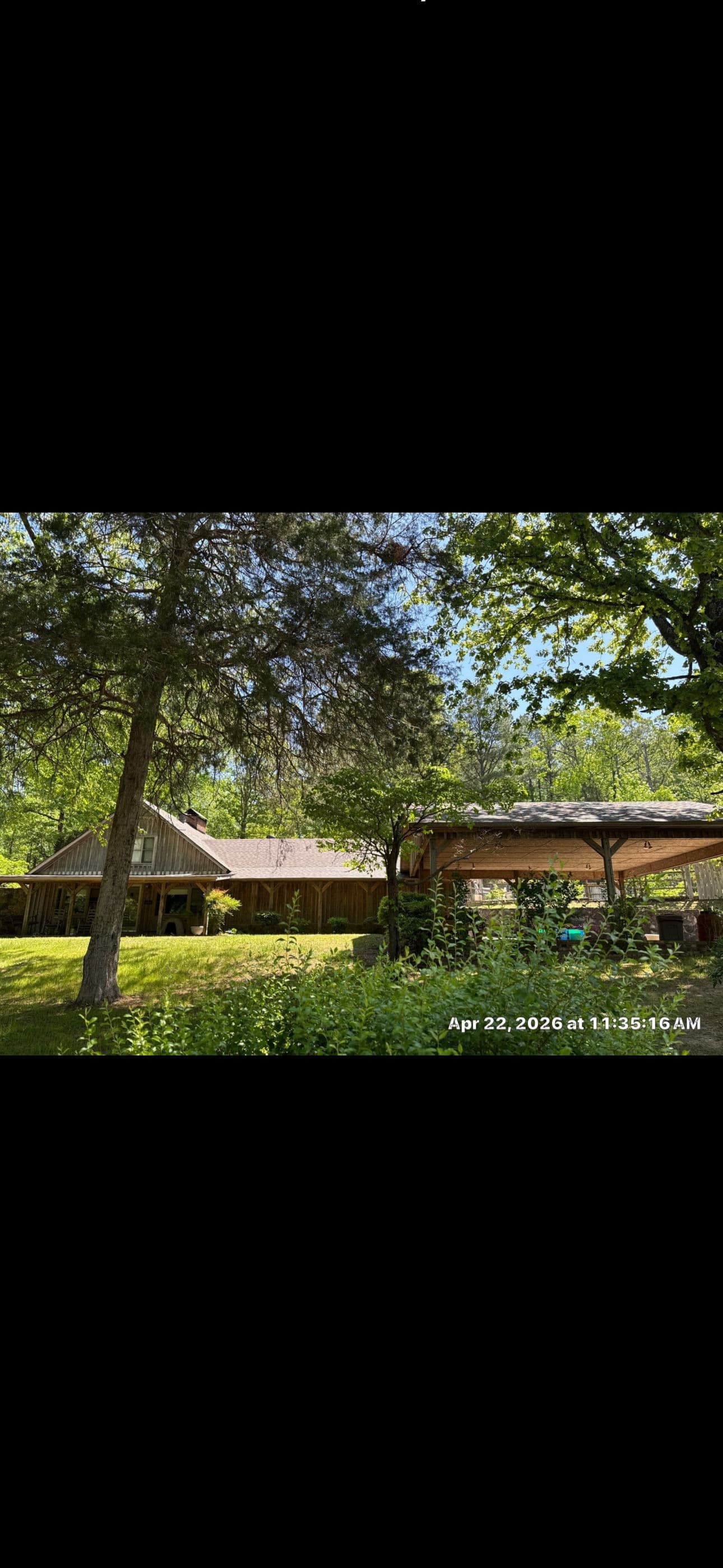 Project Full roof tear off and install on a wooded cabin in brilliant al image