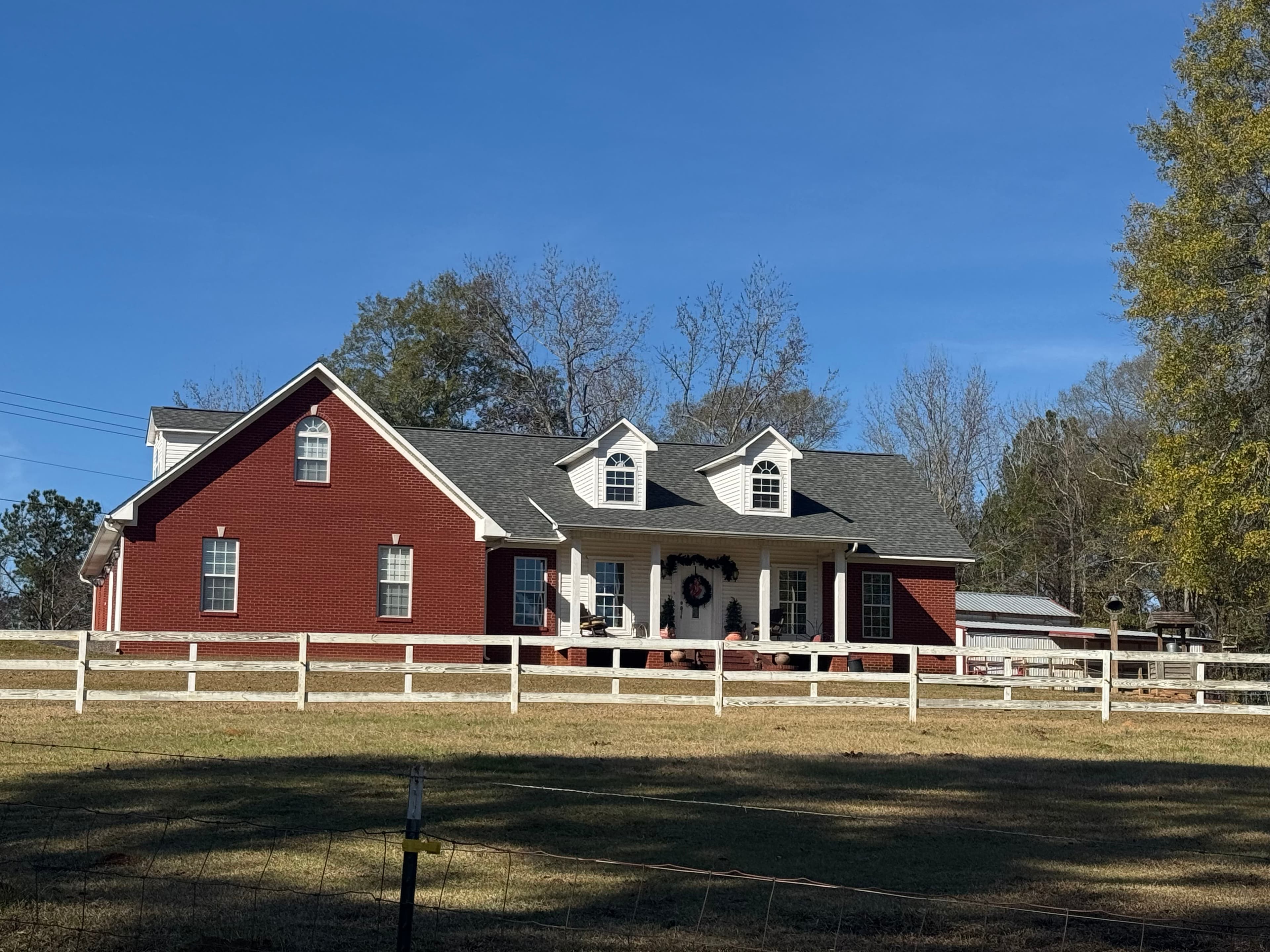 Project Expert Roof Installation on Charming Red Brick Home image